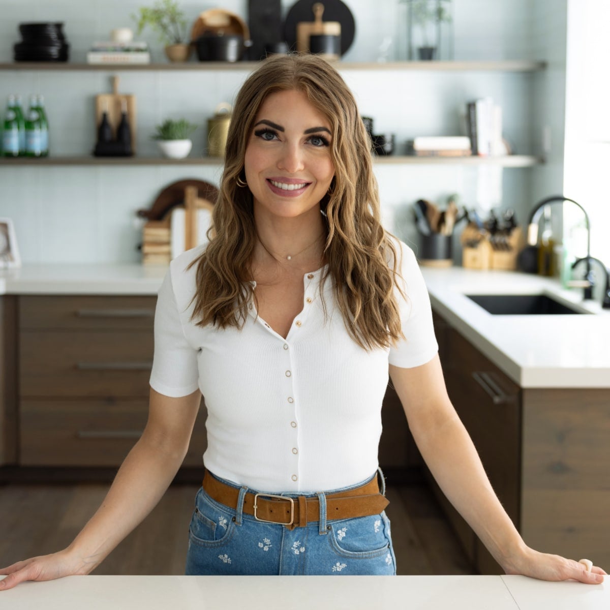Chelsea in her kitchen